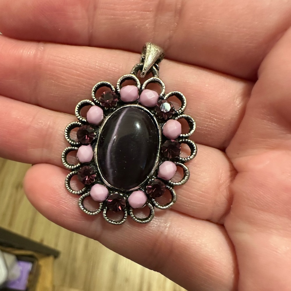 Unique purple garnet type stone pendant